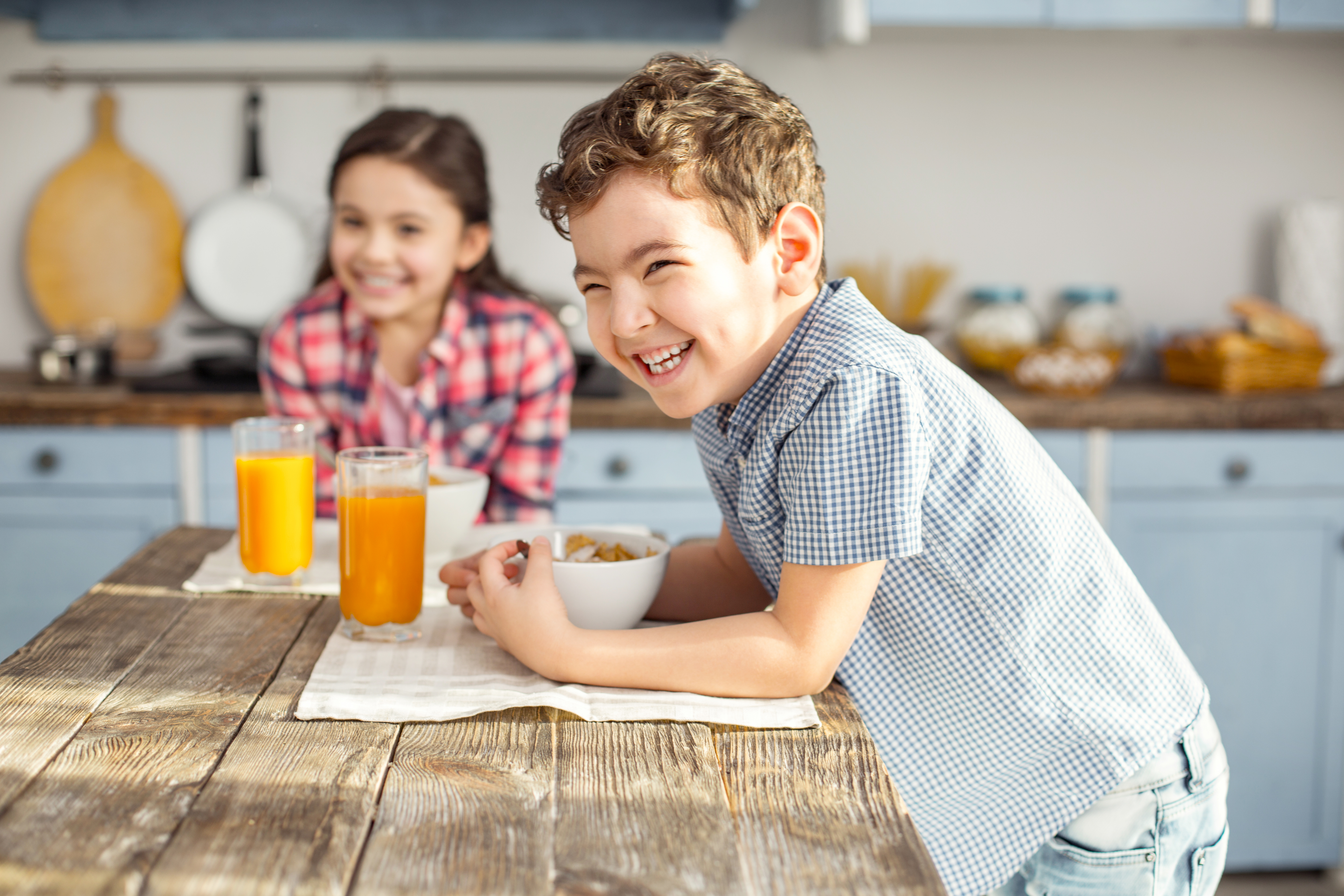 Kids enjoying breakfast before school