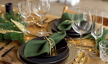 Dining room table set for a holiday party.