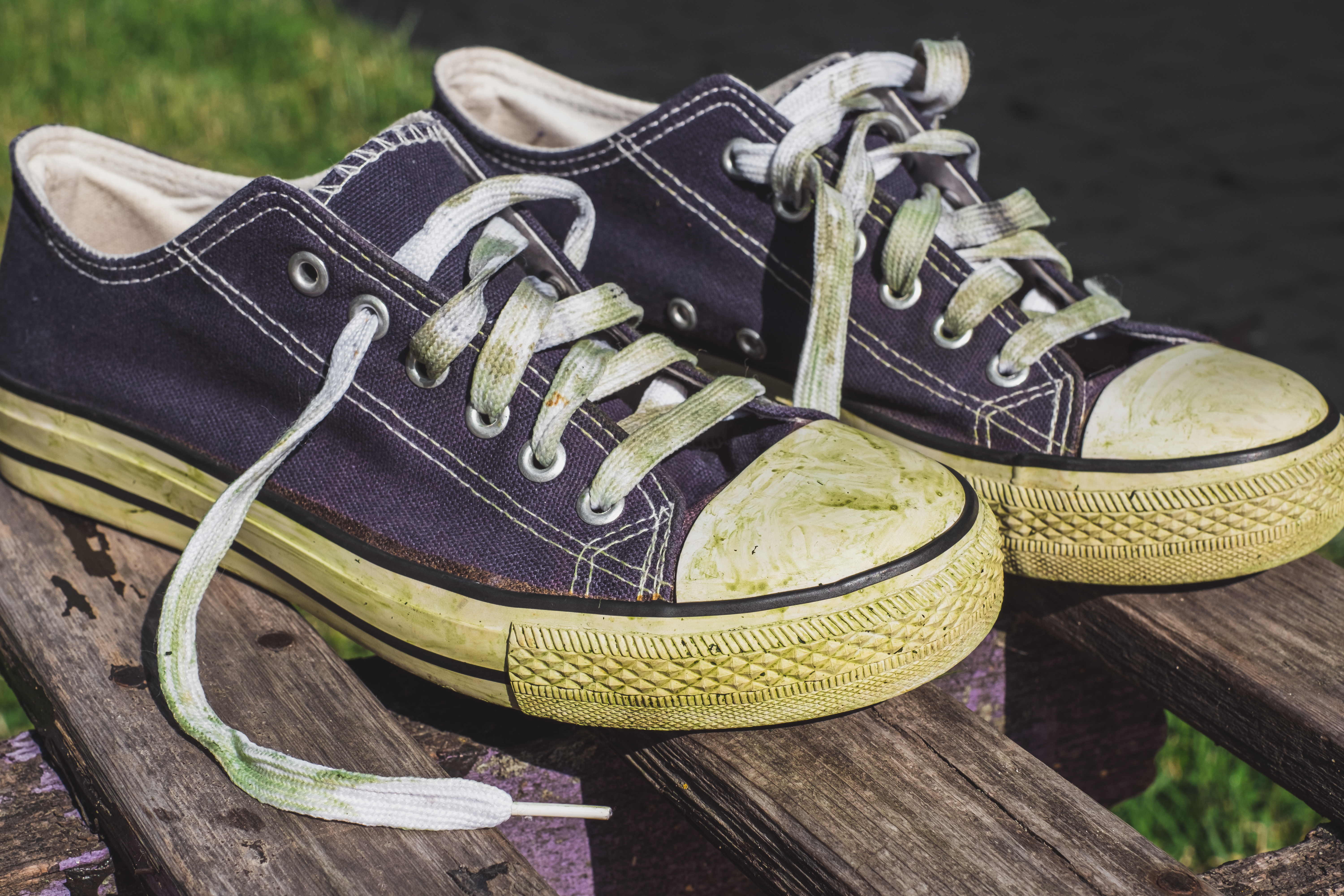 Dirty, grass stained canvas shoes