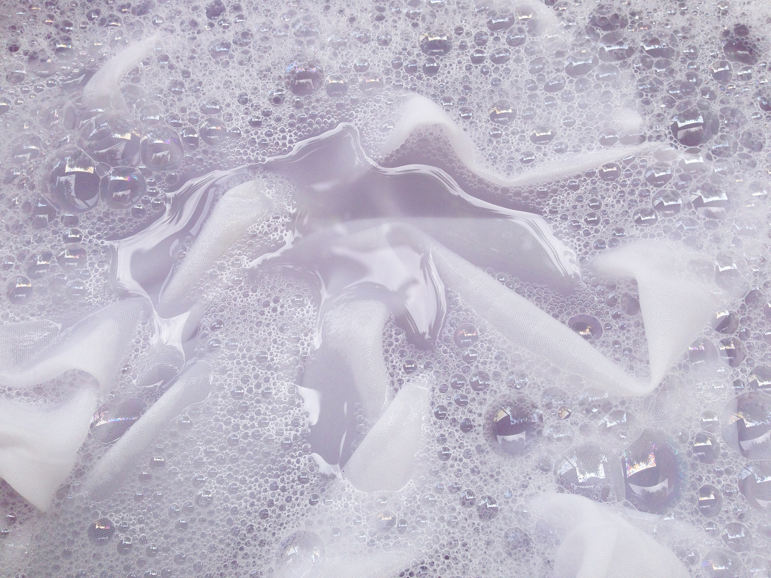 White clothing being washed