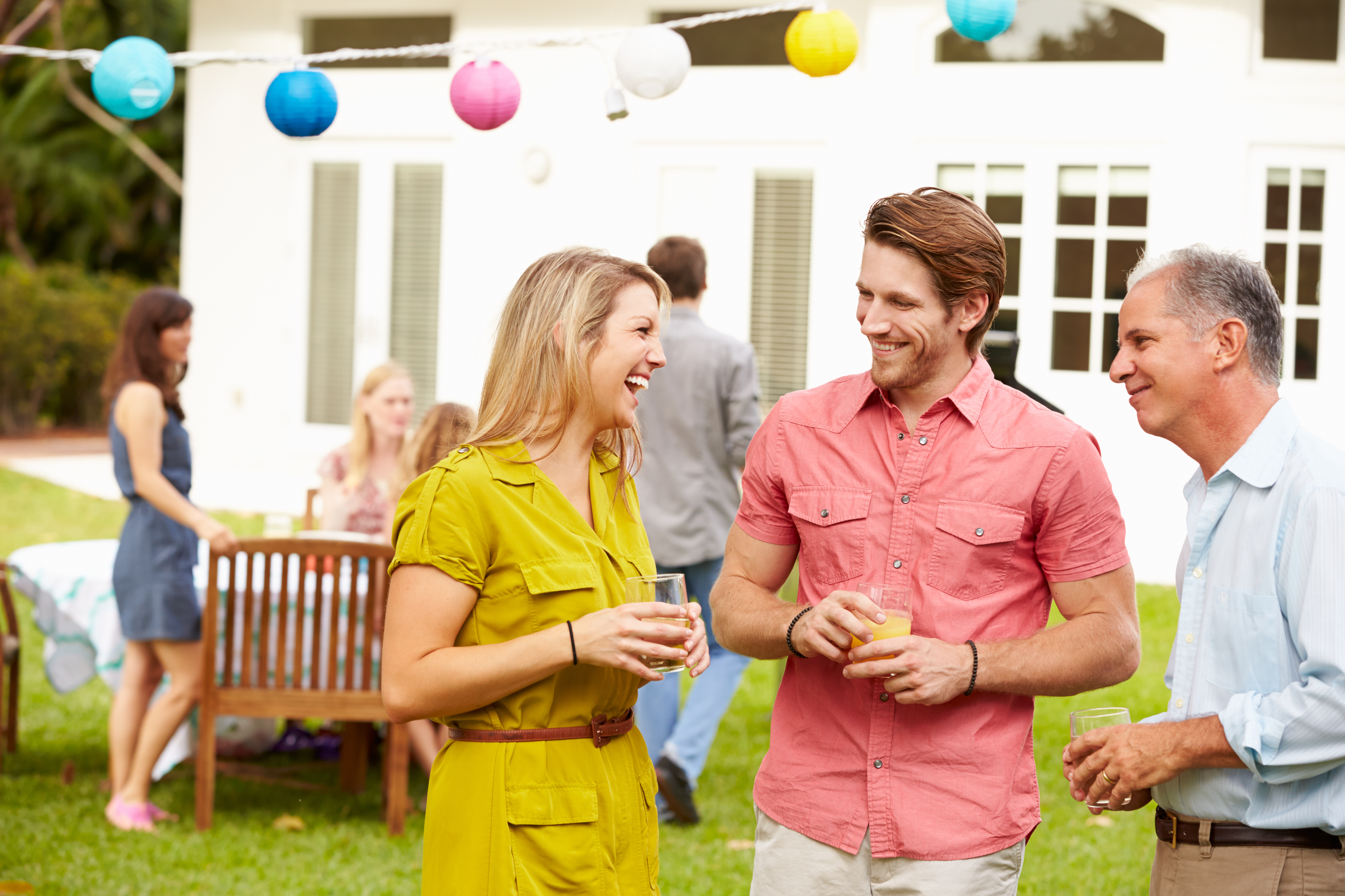 People talking in backyard together