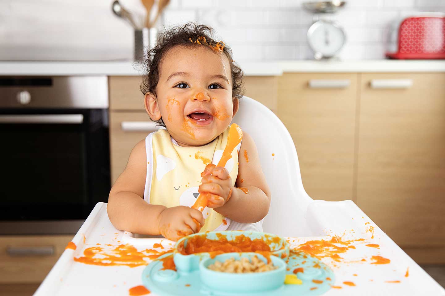 Baby eating messy food